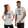 A man and woman wearing t-shirts with the words " high on life ".