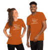 A man and woman wearing orange shirts.