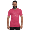 A man with a beard wearing a pink shirt