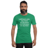 A man with a beard wearing a green shirt.