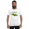 A man wearing a t-shirt with the words " rasta reggae " on it.