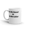 A coffee mug with the words are we human or are we coffee written on it.