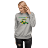 A woman wearing a sweatshirt with a picture of a bird.