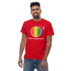 mens-heavyweight-tee-red-front-2-6267271bdab69 A man wearing a red shirt and jeans.