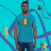 A man wearing a blue shirt with some kind of rainbow on it