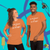 unisex-staple-t-shirt-burnt-orange-front--0001 A man and woman posing for the camera wearing orange shirts.