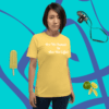 unisex-staple-t-shirt-yellow-front-628f1d08857 A woman standing in front of a blue wall.