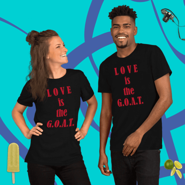 A man and woman wearing matching black Love is G.O.A.T. shirts