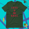 A green shirt that says love is the g. O. A. T