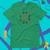 A green shirt that says love in red letters.