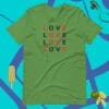 A green shirt that says love in red letters.