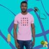 A man wearing a t-shirt that says love