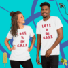 A man and woman posing for the camera wearing t-shirts.