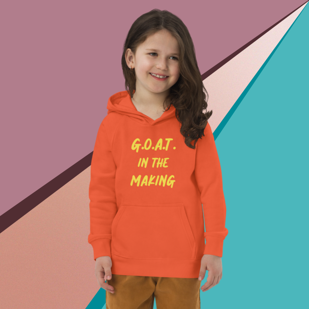 A young girl wearing an orange hoodie