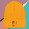 A small picture of a gold beanie