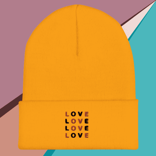 A small picture of a gold beanie