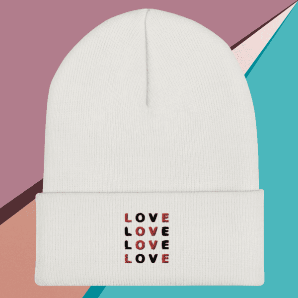 A small picture of a cuffed Love white beanie