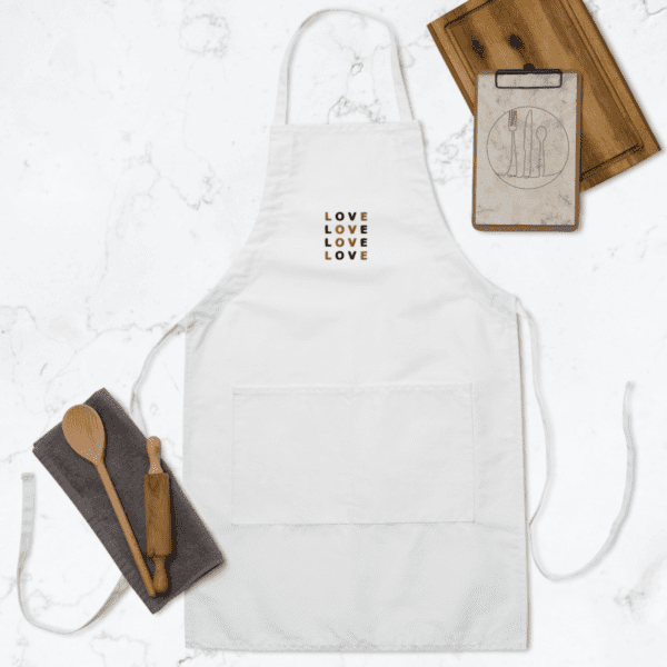 A white embroidered apron