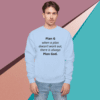A man wearing a blue sweatshirt with the quote " plan god ".