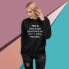 A woman wearing a black sweatshirt with the words " plan god ".