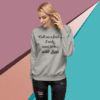A woman wearing a gray sweatshirt with the words " call me a fool, i only want to be...".