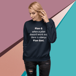 A woman wearing a navy sweatshirt