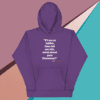 A purple hoodie with an image of a quote.