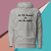 A gray hoodie with the words are we human or are we coffee written on it.