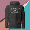 A black hoodie with the words are we human or are we coffee written on it.