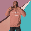 A man wearing a pink hoodie with the words " are we there yet ?" and " are we coffee "? written on it.
