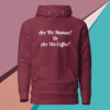 A maroon hoodie with the words are we human or are we coffee written on it.