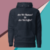 A black hoodie with the words are we human or are we coffee written on it.
