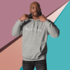 A man in grey hoodie with the word " blessed " on it.