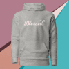 A gray hoodie with the word blessed written on it.