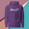 A purple hoodie with the word blessed written on it.