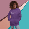 A woman wearing a purple hoodie with the word blessed written on it.