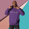 A man in purple hoodie with the word bleted on it.