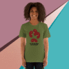 Smiling woman wearing an olive green graphic T-shirt with abstract red shapes.