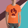 Orange t-shirt with a bold, abstract design and text.