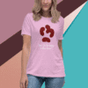 Light pink t-shirt with a paw print and text design.