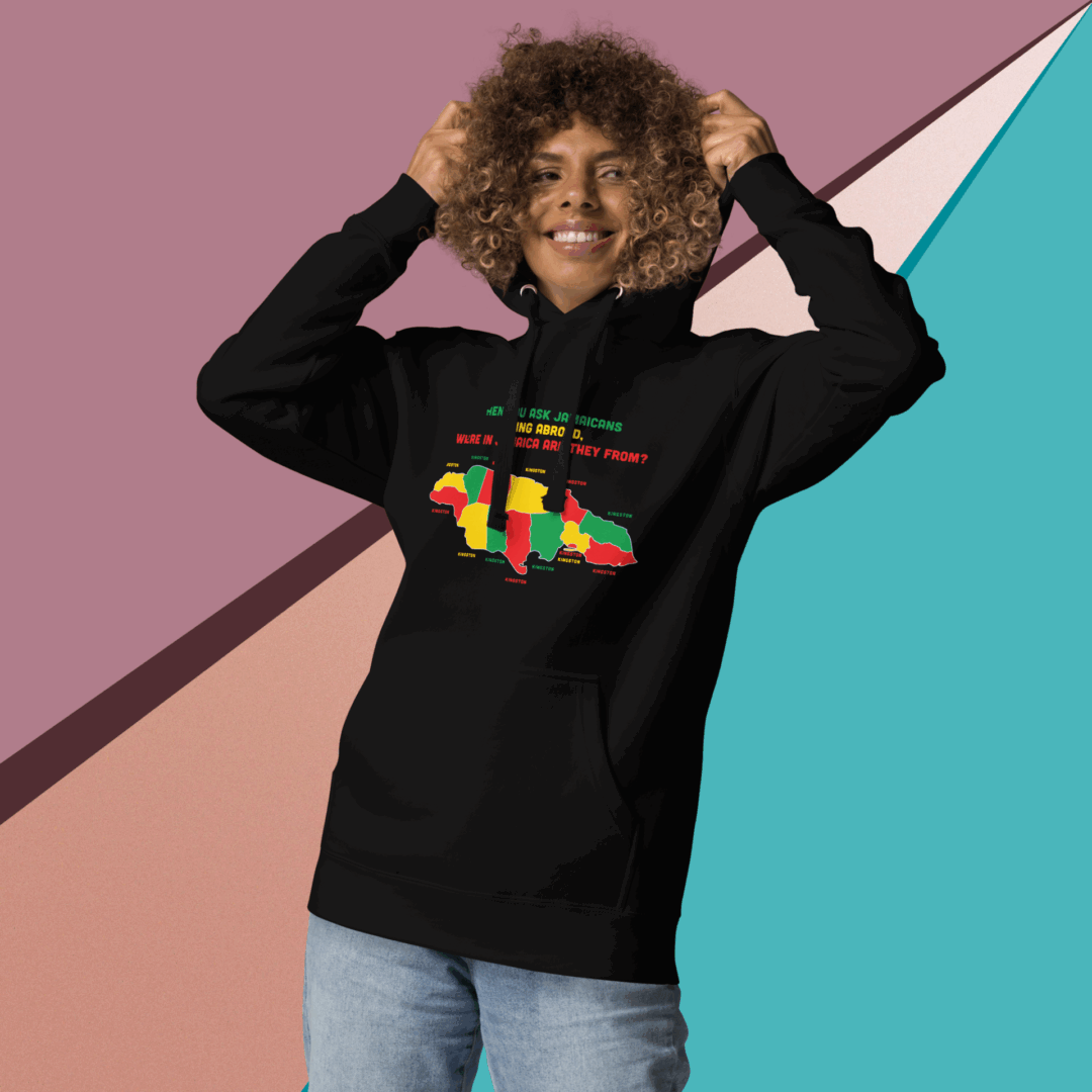 Person wearing a black hoodie with a colorful map design.