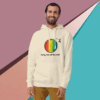cotton-heritage-m2580-i-unisex-premium-pullover-hoodie-bone-front-68e324073973b Man wearing a cream hoodie with a colorful circular design and text.
