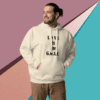 Man wearing a hoodie with the message 'LIVE by the G.O.A.L.'