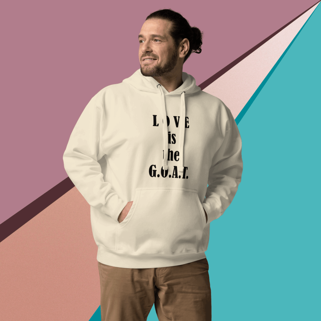 Man wearing a hoodie with the message 'LIVE by the G.O.A.L.'