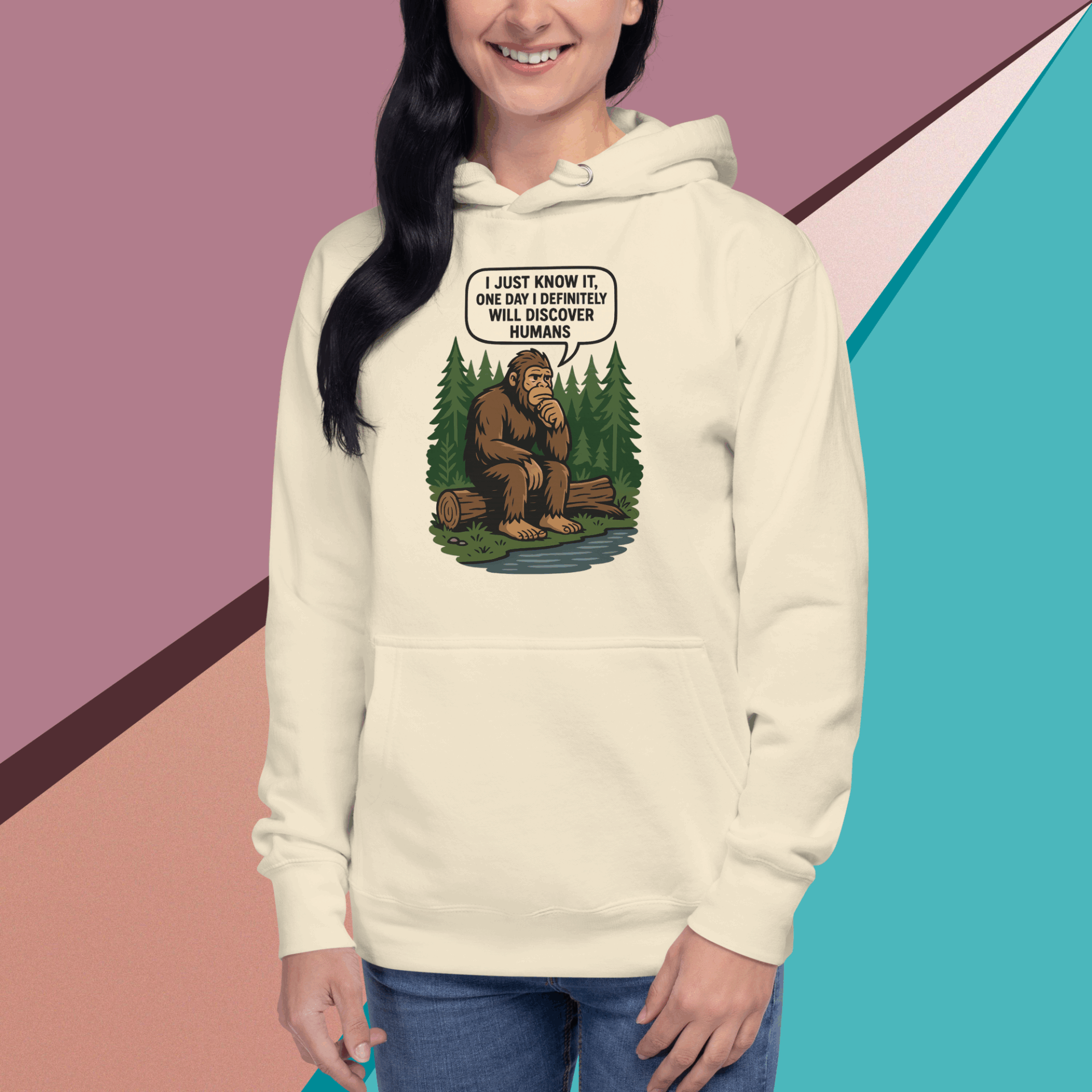 A woman wearing a hoodie with a Bigfoot cartoon and the text about Bigfoot not being a bear.