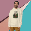Man smiling wearing a graphic beige hoodie against a stylish geometric background.
