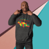 Man wearing a dark hoodie with a colorful African continent design.