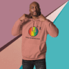 cotton-heritage-m2580-i-unisex-premium-pullover-hoodie-dusty-rose-front-68e3264684049 Man wearing a pink hoodie with a colorful clock design.