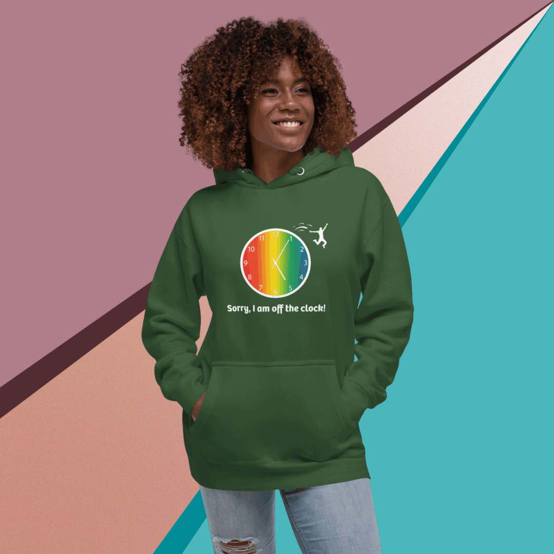 Smiling woman wearing a green hoodie with a colorful design.