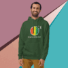 Man wearing a green hoodie with a colorful circular design and text.